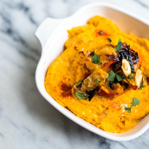 This roasted carrot hummus is delicious and vegan and gluten free, serve it with socca bread or flat bread. Get the recipes here!