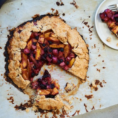 This gluten free and paleo galette is filled with rhubarb, peaches and blueberries. It is sugar free and sweetened with coconut sugar and uses almond flour and tapioca.